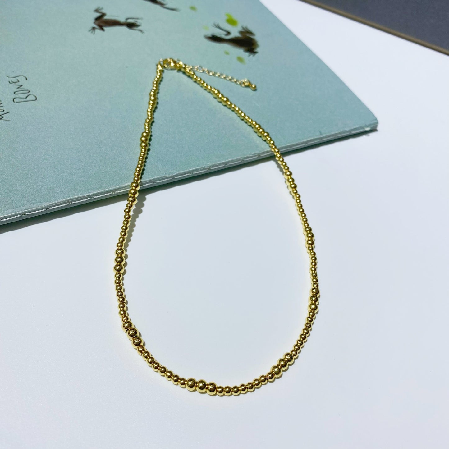 Gold Bead Eye Necklace